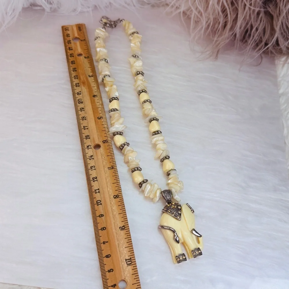 Vintage Cream Polished Stone Weighted Necklace with good luck Elephant Pendant